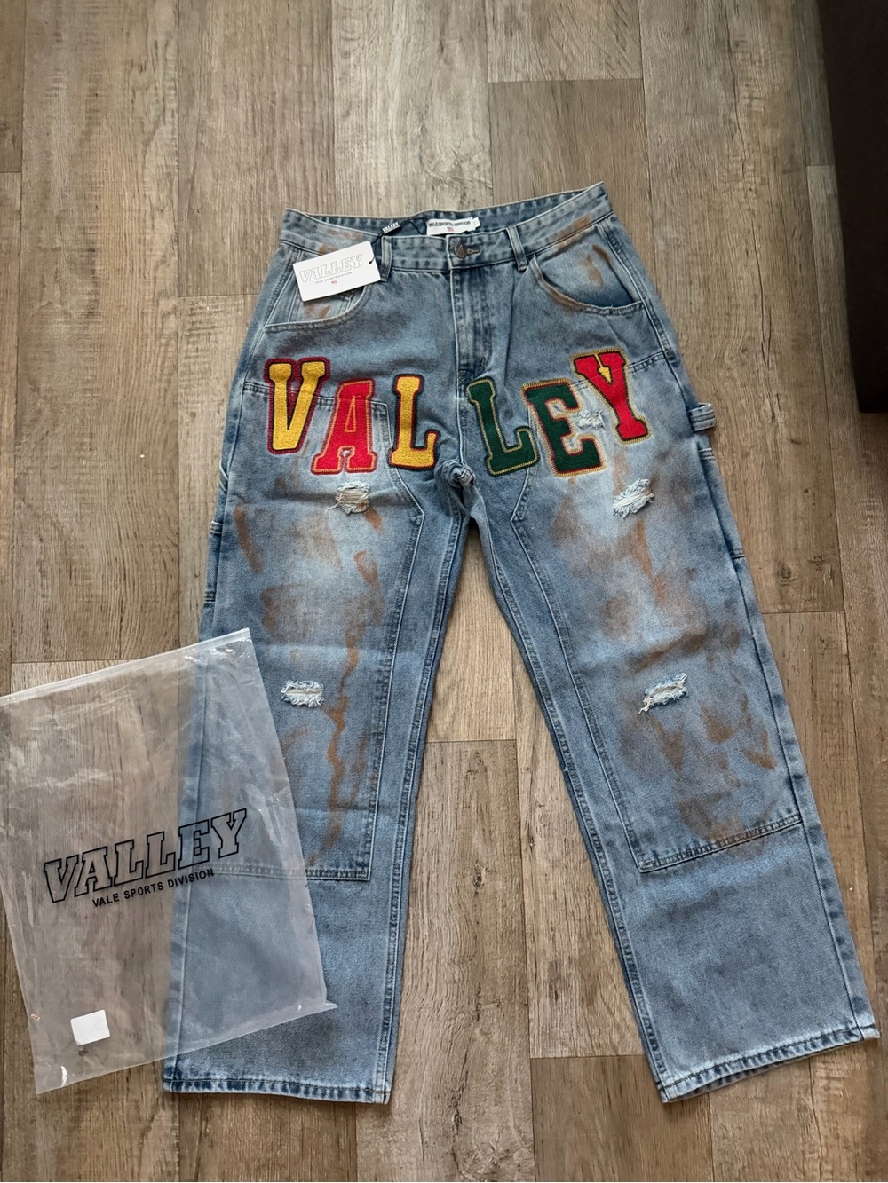 Others Follow Light Blue Jeans with Multicolor VALLEY Patch